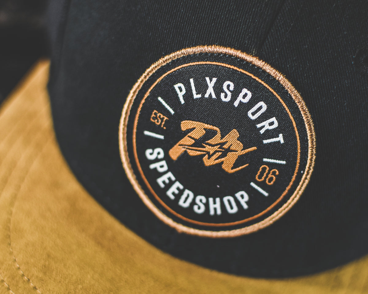 Écusson brodé PLX Sport Speedshop sur une casquette